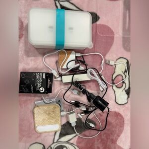 Assorted cords, accessories, and portable chargers